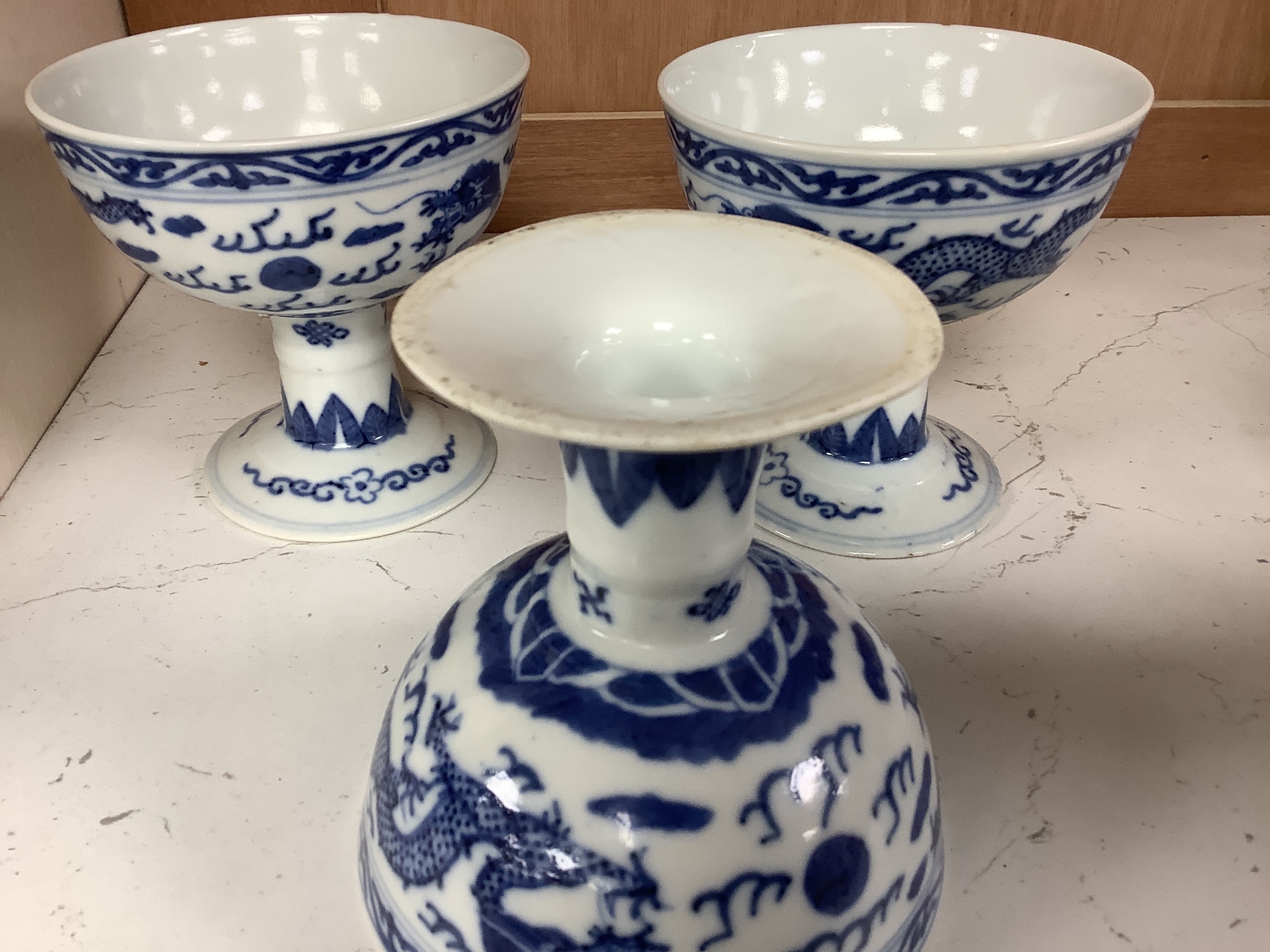 Three Chinese blue and white porcelain stem cups, c.1900, 9.5cm